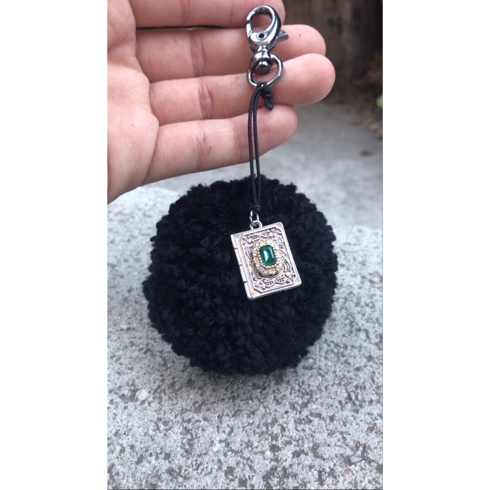Handmade Black Pom Pom with spell book charm